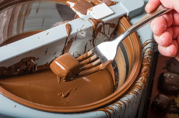 Candy maker using a coating machine — Stock Photo, Image