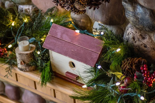 Mantel decorated for Christmas with lights — Stock Photo, Image