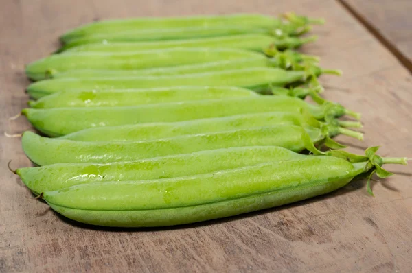 Group of fresh green pea pods — Stock Photo, Image