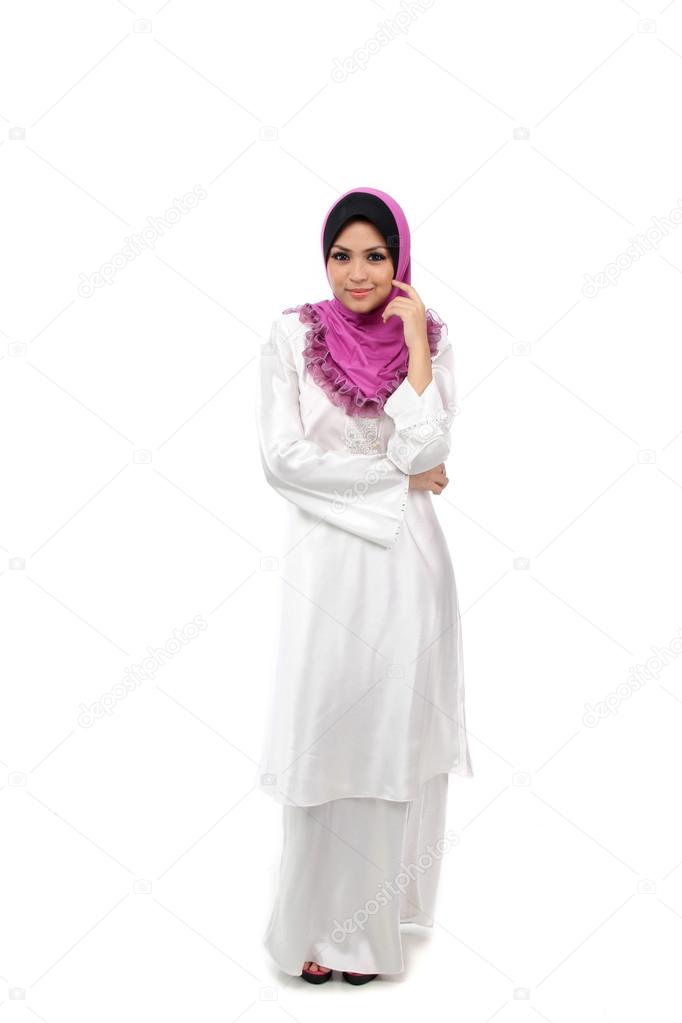 Young Asian Muslim smiling in pose