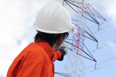Men working at electricity main power pole clipart