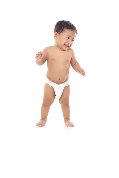 Очаровательный азиатский ребенок плачет на белом фоне Лицензионные Стоковые Фото