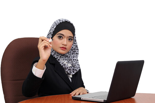 Young asian muslim business women in present action
