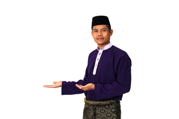 Asian muslim male with traditional Malay costume in present text — Stock Photo, Image