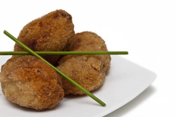 Croquettes on white plate — Stock Photo, Image