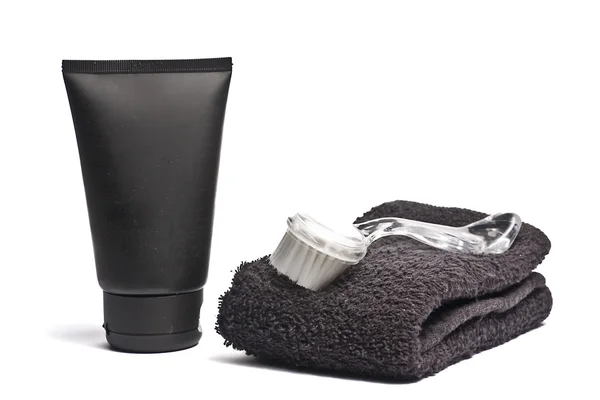 tüp krem temizlik ve havlu üzerinde fırça