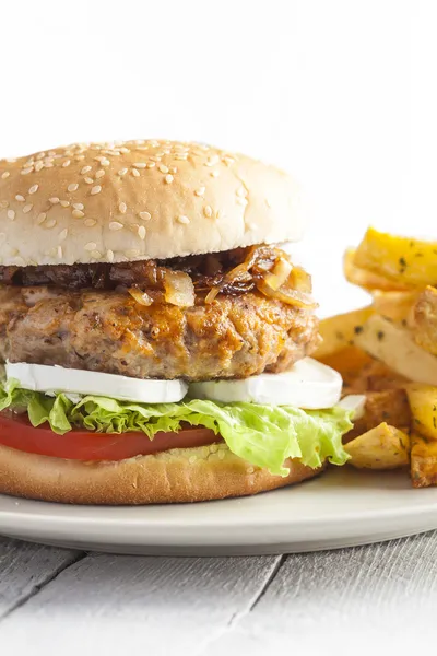 Gourmet burger and french fries — Stock Photo, Image