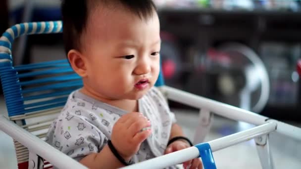 Naughty Baby Boy Smile While Eat Porridge Sit Infant Chair — Stock Video