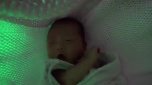 Flickering Led Light Annoyed Newborn Baby Swing — Stock Video