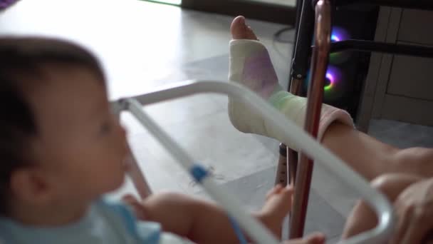 Selective Focus Broken Leg Plaster Bandage Take Care Child Baby — Stock Video