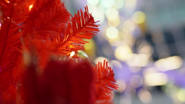 Rojo Falso Árbol Navidad Hojas Con Parpadeo Led Luz Fondo — Vídeos de Stock