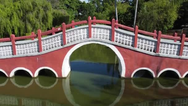 Aerial Ascending Look Red Chinese Style Bridge — Stockvideo