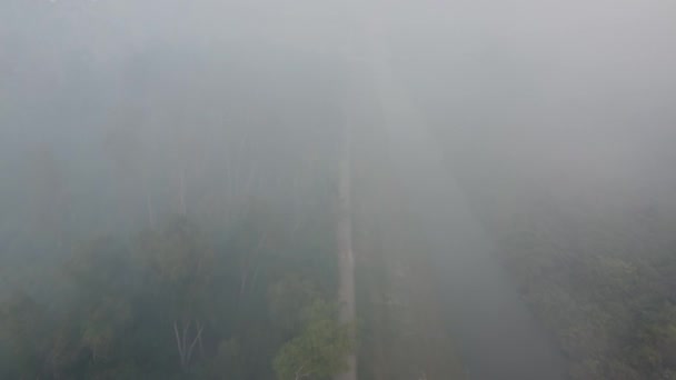 Aerial View Blurry Rural Path Due Fire Burning Release Smoke — Vídeo de Stock