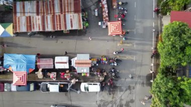 Seberang Perai, Penang, Malaysia - Dec 08 2021: Aerial look down local people buy necessity at morning outdoor market