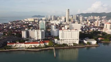 Georgetown, Penang, Malaysia - Jun 12 2022: Aerial view Eastern and Oriental Hotel and skyscraper building at Georgetown in morning