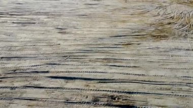 Aerial view yellow soil of trace excavator and tractor at reclamation land