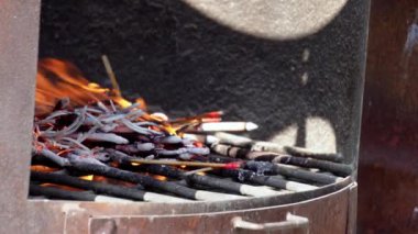 Select focus joss stick burn at furnace of Chinese temple
