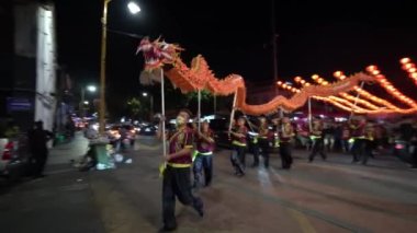 Georgetown, Penang, Malaysia - Jan 31 2022: Dragon dance performance at street during Chinese New Year