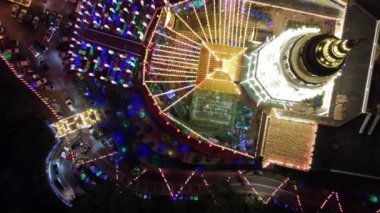 Ayer Itam, Penang, Malaysia - Feb 19 2022: Aerial look down car traffic at Kek Lok Si temple in night