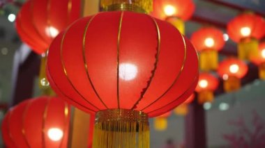 Slow rotation follow track red Chinese lantern ornament hanging during Chinese New Year