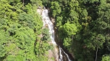 Aerial view beautiful water cascading at waterfall Penang Botanical Garden