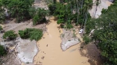 Aerial view car is stuck and damage during flash flood