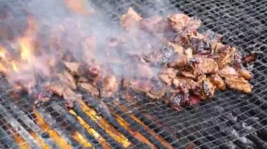 Delicious lamb mutton meat is roasted on charcoal . Delicious street food
