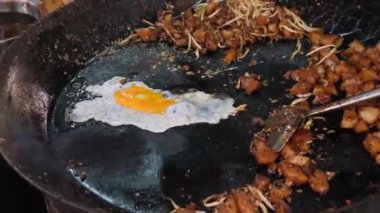 Duck egg is cooked with Char Kueh Kak. Delicious Malaysia street food