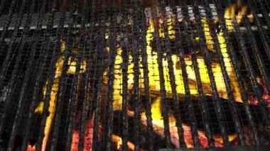 Close focus fire burning of charcoal preparation for grilled food