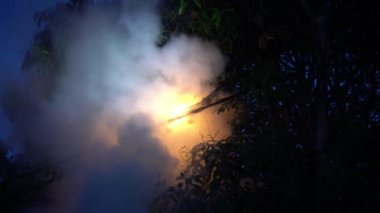 Fire extinguisher blow powder at the fire wire at outdoor