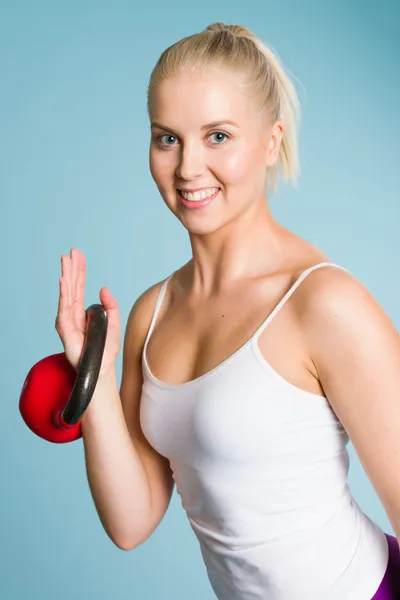 Girl and kettlebell — Stock Photo, Image