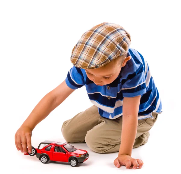 Chłopiec i zabawki samochodu — Zdjęcie stockowe