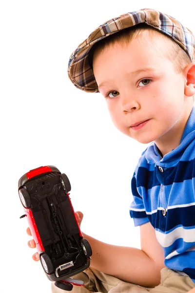 Niño y coche de juguete — Foto de Stock