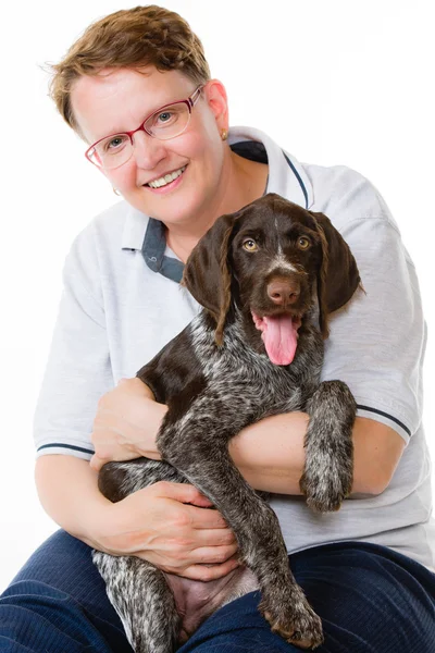Puppy and woman — Stock Photo, Image