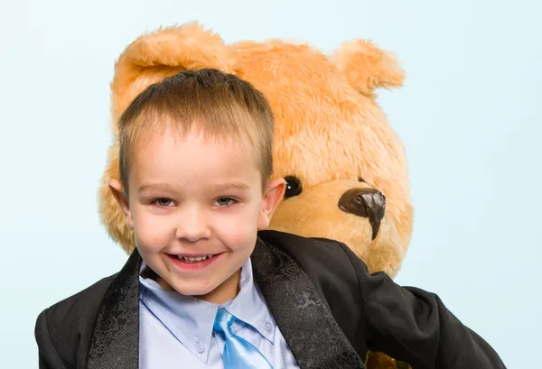 Little boy and teddy bear — Stock Photo, Image