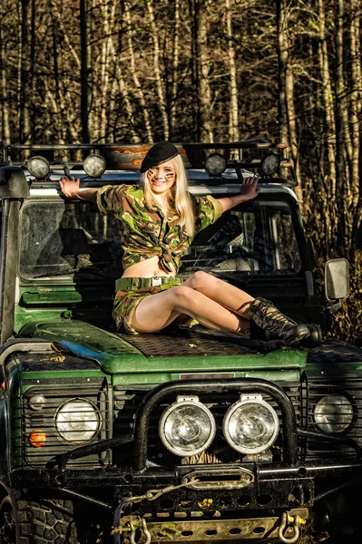 Girl and off-road vehicle — Stock Photo, Image