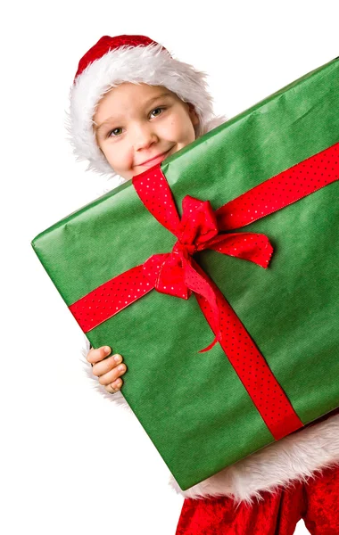 Мальчик и рождественский подарок — стоковое фото