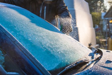 Cleans frozen windshield clipart