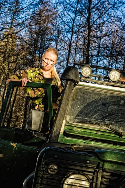 Girl and off-road vehicle — Stock Photo, Image