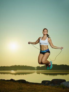Woman and skipping rope clipart