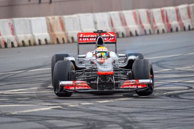 Lewis Hamilton of McLaren Mercedes at Moscow City Racing 2012 clipart