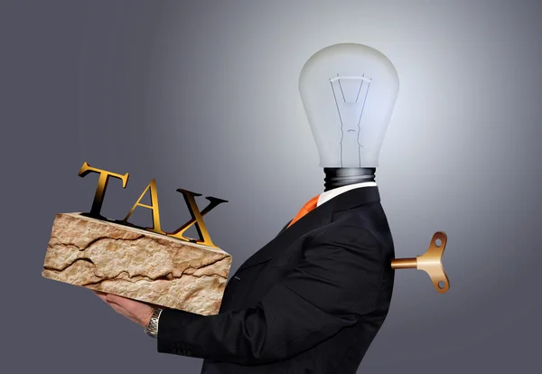 Man die de last van de belastingen draagt — Stockfoto