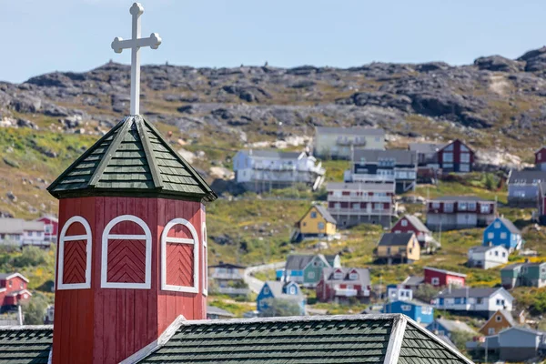 Close up of wooden Steeple and cross of Saviors Church in Qaqortoq, Greenland on 13 July 2022