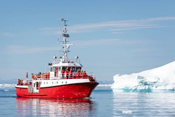 Bright Red Fishing Ship Carrying Tourists Large Icebergs Ilulissat Icefjord — стоковое фото