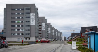 Row of modern apartment blocks on Tuapanguit in Nuuk, Greenland on 20 July 2022