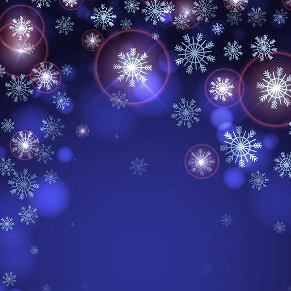 青い背景と雪の結晶. — ストックベクタ