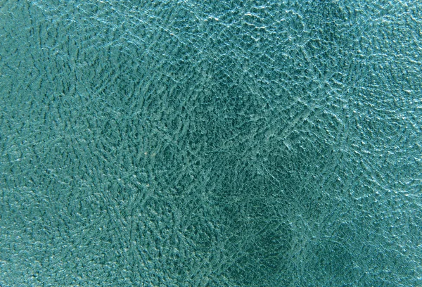 parlak deri arka plan. tonda turkuaz.