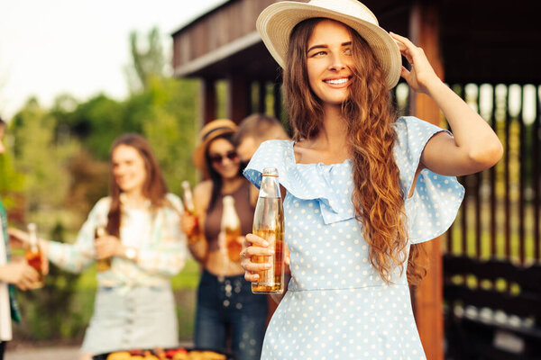 Horizontal Shot Happy Beautiful Young Woman Hat Lemonade Foreground Group Royalty Free Stock Images