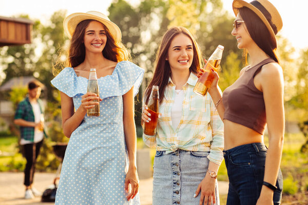 Three Young Beautiful Smiling Women Summer Clothes Hats Carefree Women Royalty Free Stock Photos