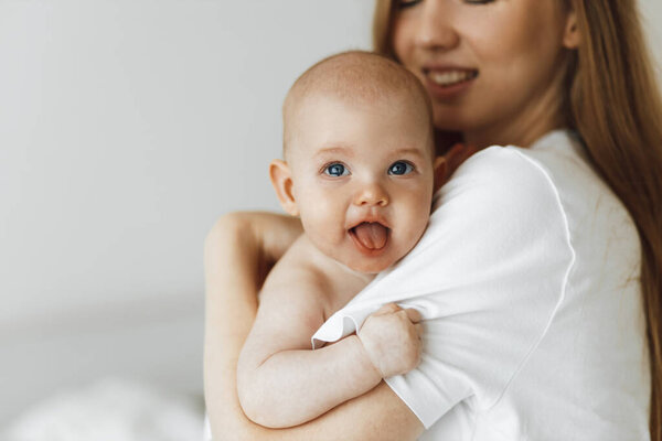 Young Caring Mother Hugged Her Little Daughter Pressing Her Her Stock Photo